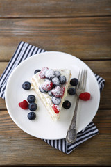 Cake with blueberries and raspberries