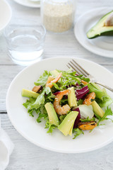Delicious salad with shrimp and avocado