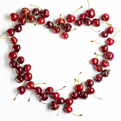 Red cherries on a white background