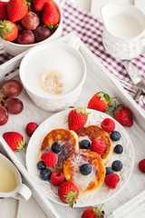 Cheese pancakes with fresh berries