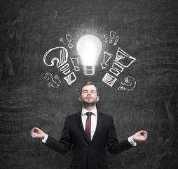 Mediating businessman is brainstorming the business problems. Turned lightbulb and question and exclamation marks.
