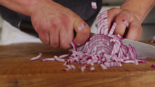 Chopping red onion