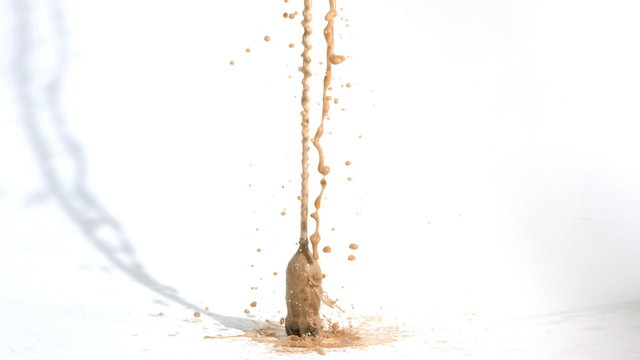 soda exploding in slow motion 