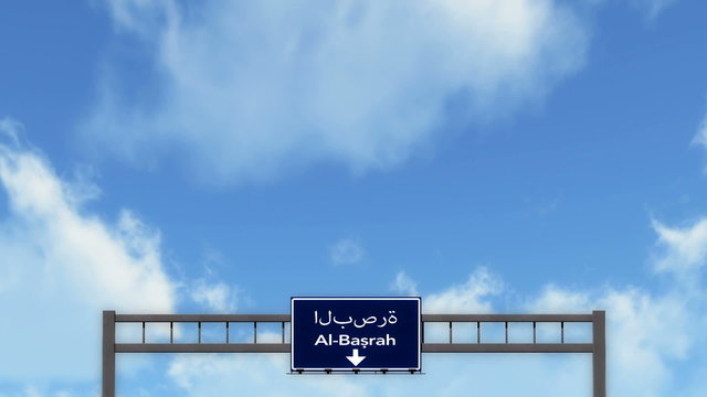 Passing under Al Basrah Iraq Highway Road Sign
  