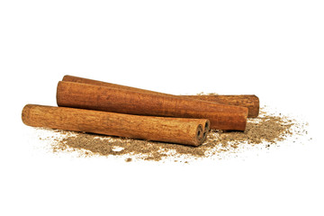 Cinnamon sticks and powder on white background
