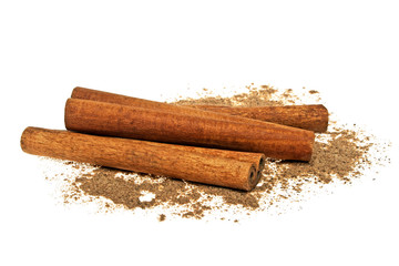 Cinnamon sticks and powder on white background