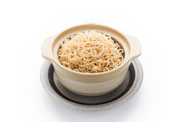 Boiled chinese noodles in ceramic bowl on white background
