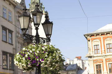 Fototapeta na wymiar Old lantern on square in Lviv. Western Ukraine
