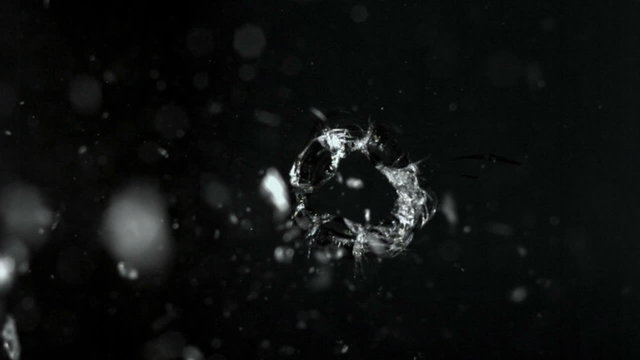 Bullet through glass, slow moition