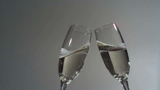 Champagne toast in super slow motion. Shot with Phantom camera at 6900 frames per second.