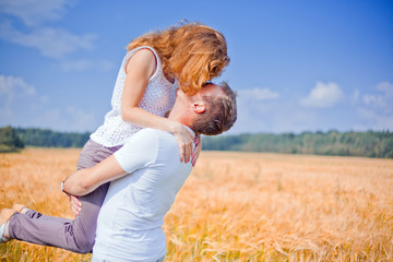 Couple in a wheat field