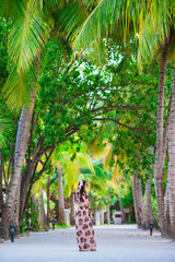Young beautiful woman during tropical beach vacation