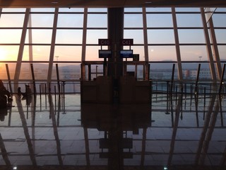 sunset at airport terminal