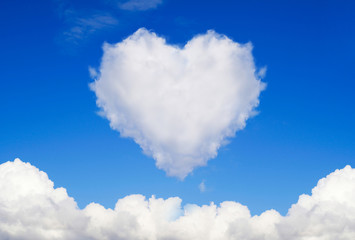 Naklejka na ściany i meble Heart shaped clouds in the sky