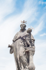 beautiful statue on St. Anthony of Padova on charles bridge