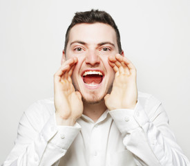 businessman in white shirt  shouting 