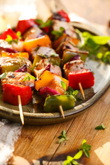 Skewers of salmon and vegetables