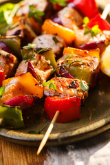 Skewers of salmon and vegetables