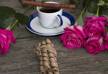 coffee still life, pink roses and cookies