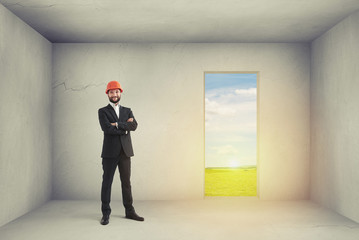Fototapeta premium man in room with open door