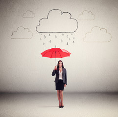 woman in formal wear holding red umbrella