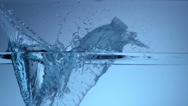 Water bottle splash in slow motion