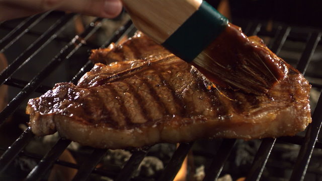 Barbecue sauce on t-bone steak
