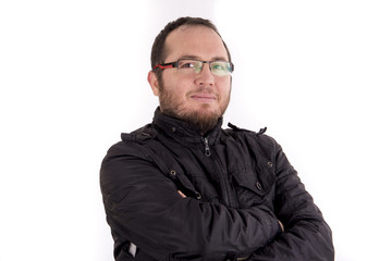 portrait of handsome young man wearing glasses against white background