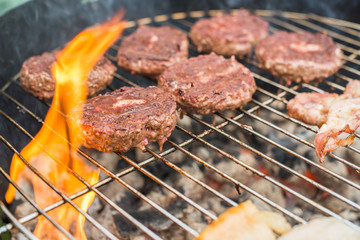 grilled hamburgers on the fire