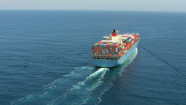 Aerial shot of container ship in ocean