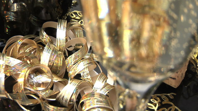 Close up of cork, champagne, ribbons on New Years 