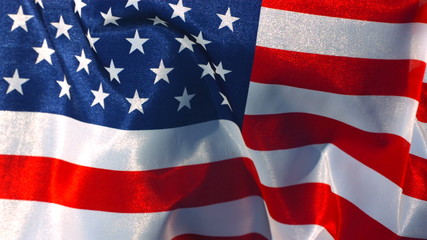 United States flag waving in wind - Powered by Adobe
