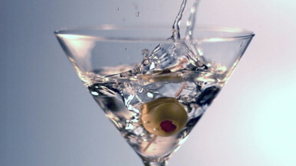 Slow motion olive splash - Powered by Adobe