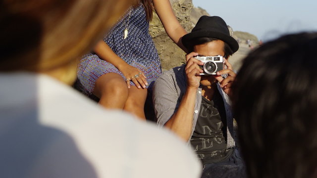Group of young people together at beach