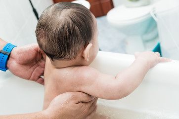 Cute baby boy in the bathtub