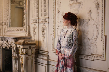 beautiful woman standing in the palace room. 