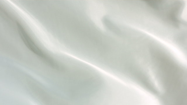 White silk fabric blowing in the wind, abstract background