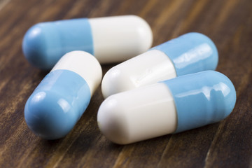 Blue capsules on the table