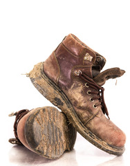 Old  boot in mud