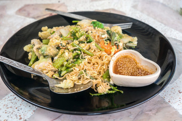 noodle stir fry with vegetable ,Thai name is Sookie.