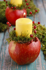 Candle holder made of apple