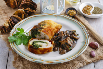Chicken roll stuffed with spinach and roasted mushroom