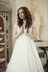 Fototapeta premium young victorian lady in white dress