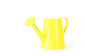 Yellow watering can isolated on white