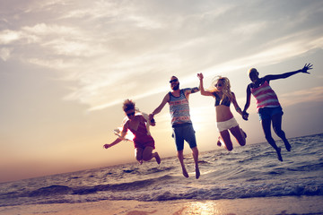 Diverse Beach Summer Friends Fun Jump Shot Concept