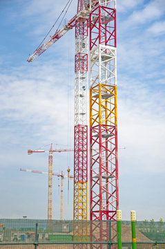 construction cranes in the blue sky in panorama picture