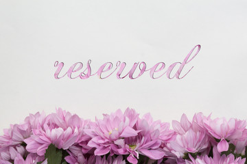 Obraz na płótnie Canvas reserved / reservation card with flowers