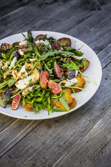 rocket salad with fig mozzarella roasted bread