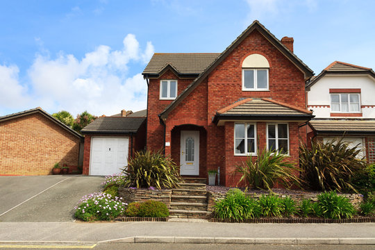 Redbrick english house with garage