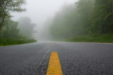 Striped Lines on a Road in the Fog